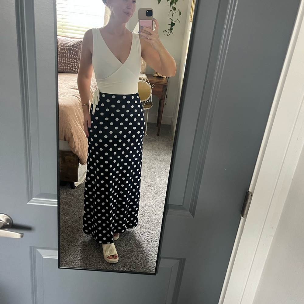 Polka dot dress. Fits like Small/lots of stretch. Deep navy skirt/cream bodice